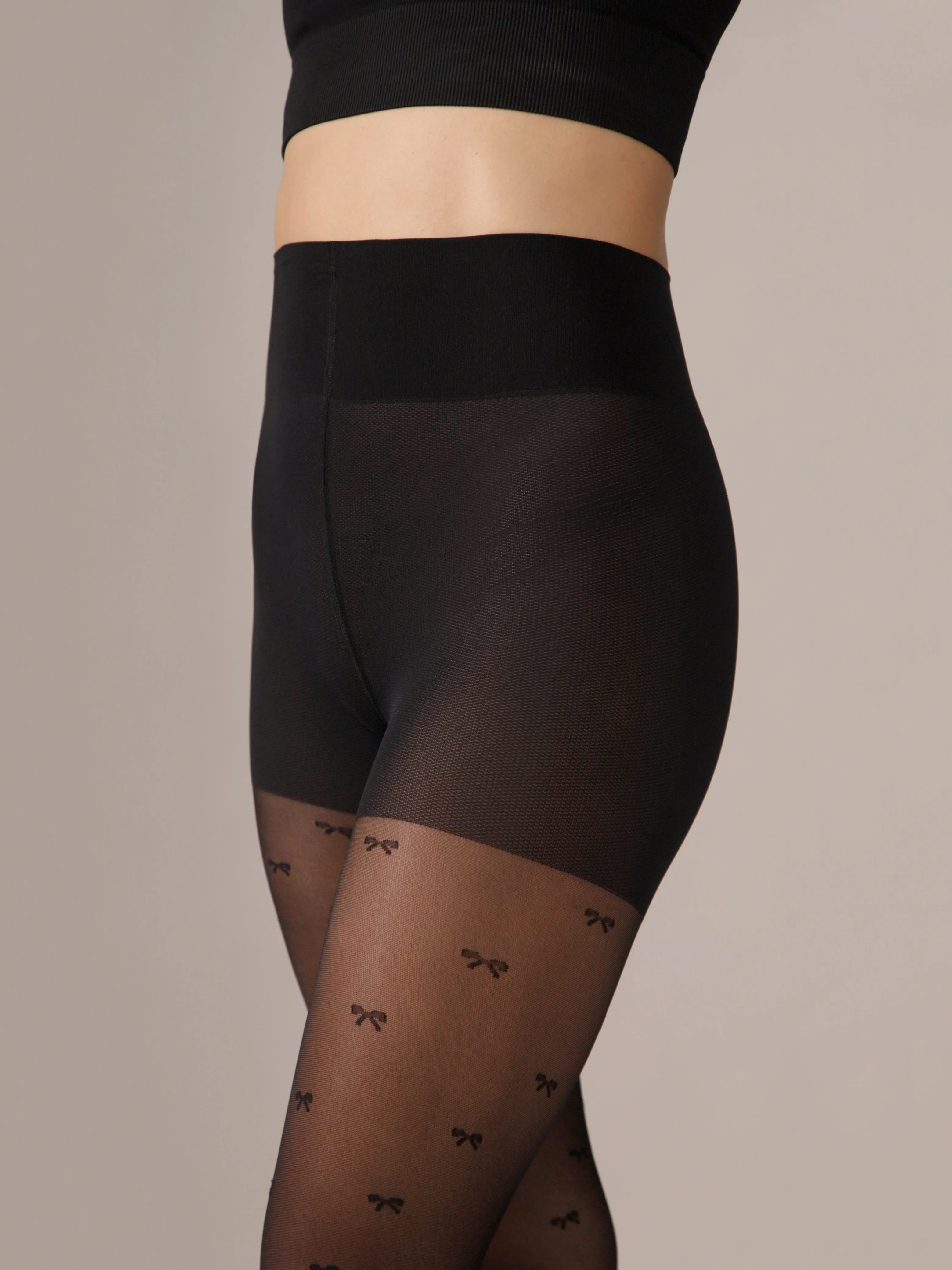 Micro Bow Pattern Smoothing Waistband Tights in Black